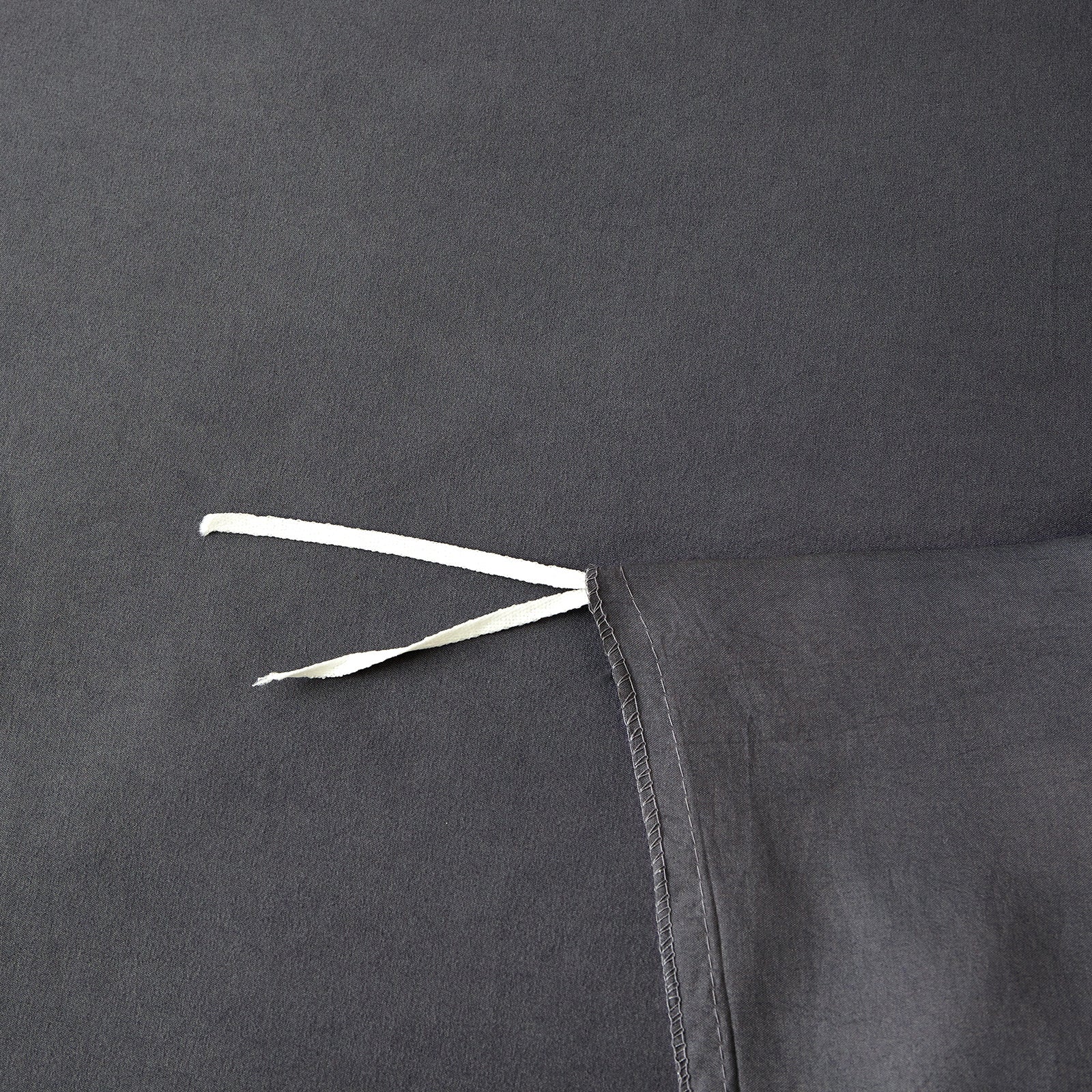 Corner ties to help prevent slipping inside the cover.