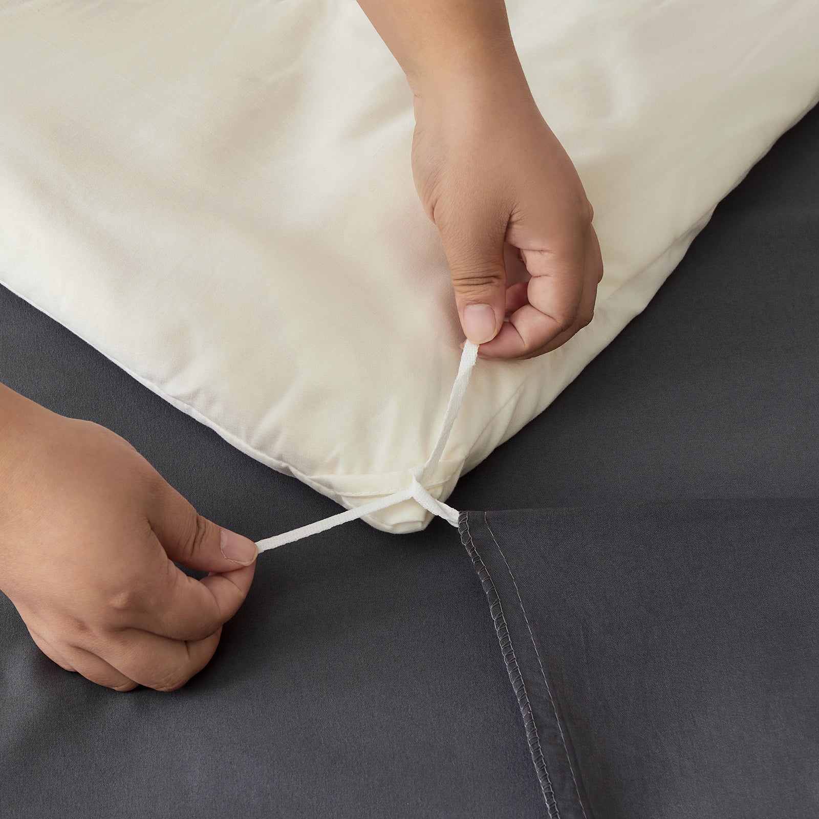 Durable corner ties on duvet cover ensuring the duvet stays perfectly aligned and secure all night.