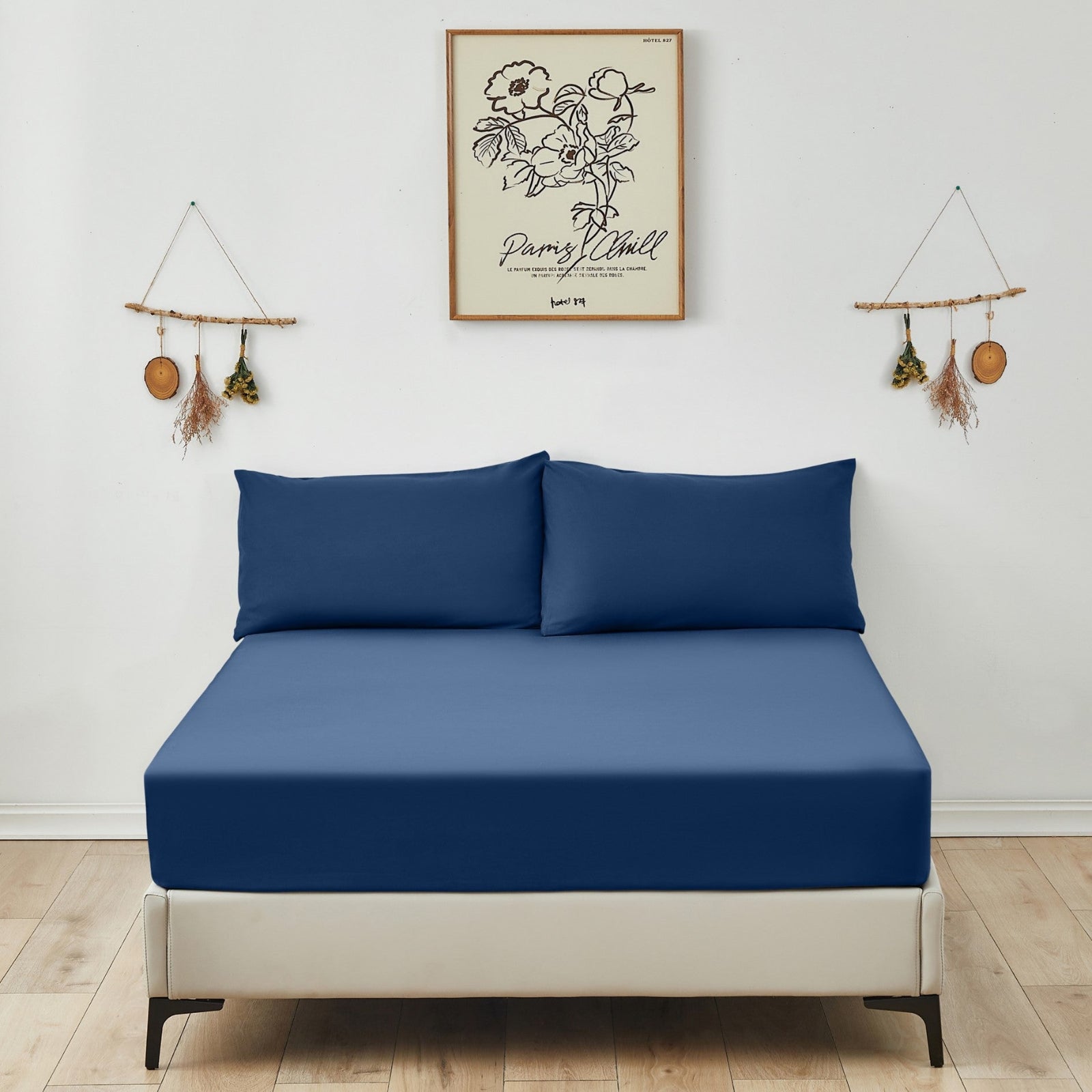 Victoria and Carter navy blue fitted sheet, showcasing its smooth, soft microfiber texture